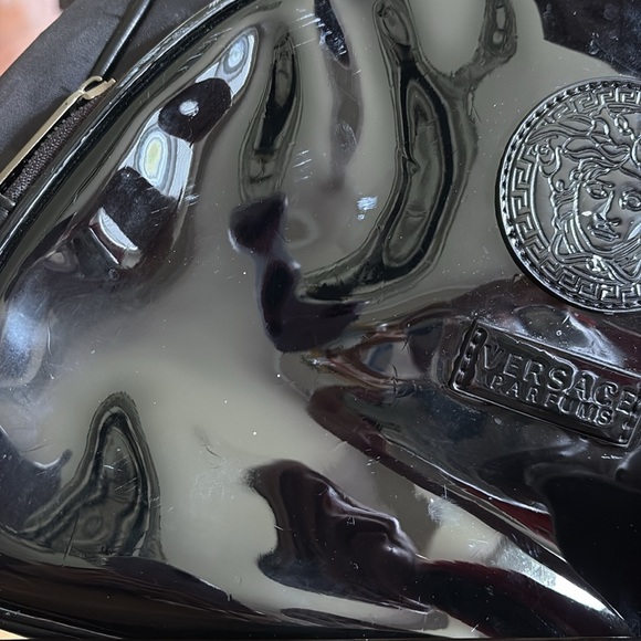 Versace Parfums  mini backpack black with minor scratches in the front
